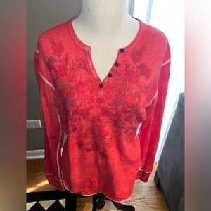 Red/pink shirt trimmed with white stitching.  Made by cut cute. Size xl.